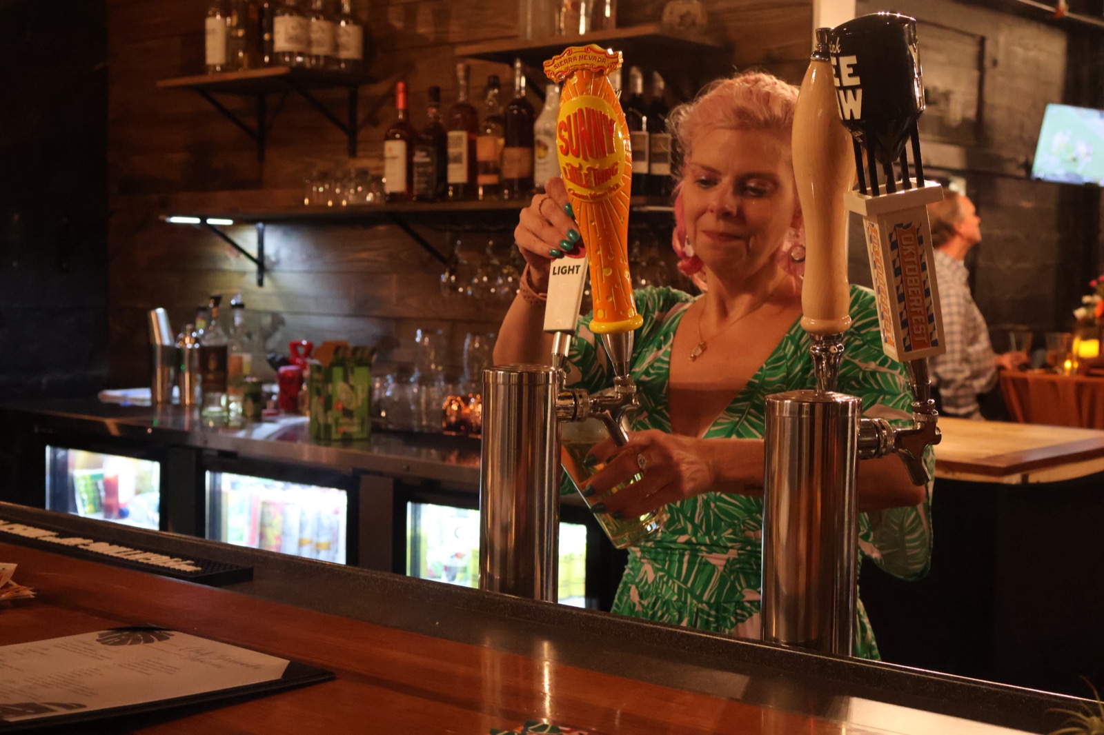 Bartender pouring a draft beer at Blue Ridge Underground