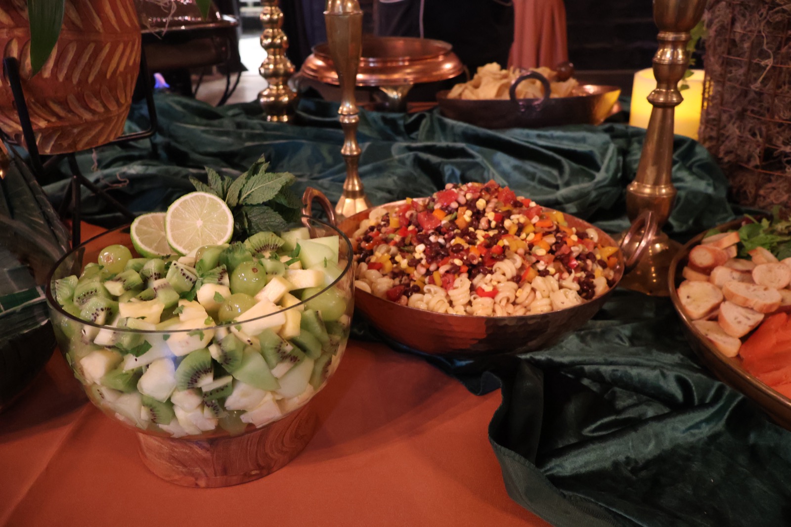 Catering spread with guests at a private event
