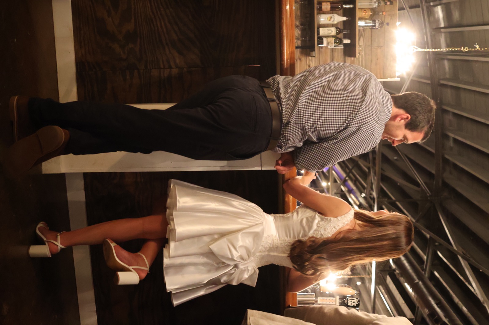 Couple cutting wedding cake at Blue Ridge Underground